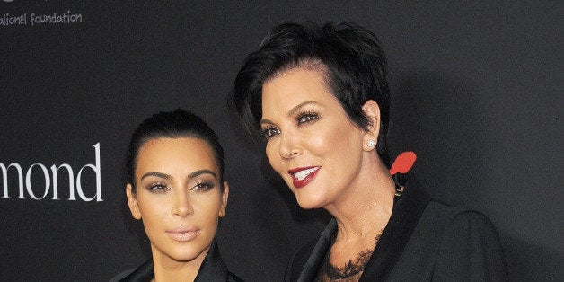 BEVERLY HILLS, CA - DECEMBER 11: Kim Kardashian and Kris Jenner arrive at Rihanna's First Annual Diamond Ball at The Vineyard
