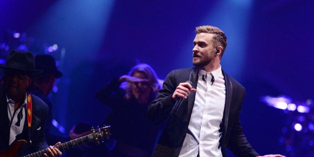 NEW YORK, NY - DECEMBER 14: Justin Timberlake performs on stage at Barclays Center on December 14, 2014 in the Brooklyn boro