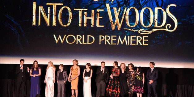 NEW YORK, NY - DECEMBER 08: Director Rob Marshall introduces Tammy Blanchard, MacKenzie Mauzy, Daniel Huttlestone, Christine Baranski, Anna K, ÃJames Corden, Emily Blunt, Meryl Streep, Tracey Ullman, Lilla Crawford and Billy Magnussen at the world premiere of 'Into the Woods' at the Ziegfeld Theatre on December 8, 2014 in New York City. The stars came out for the world premiere of 'Into the Woods' on Monday, December 8, 2014 at the Ziegfeld Theater in New York. Director Rob Marshall, the all star cast including Meryl Streep, Emily Blunt, James Corden, Anna Kendrick, Christine Baranski, Tracey Ullman and legendary composer and lyricist Stephen Sondheim and writer James Lapine were all celebrating the cinematic event, bringing the humorous and heartfelt musical to the screen. 'Into the Woods' produced by Rob Marshall, John DeLuca, Marc Platt and Callum McDougall opens in theaters nationwide on December 25, 2014. (Photo by Kevin Mazur/Getty Images for Walt Disney Studios Motion Pictures)