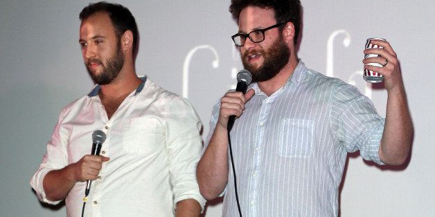 LOS ANGELES, CA - DECEMBER 25: Writers/directors Evan Goldberg (L) and Seth Rogen introduce the screening of Sony Pictures' 'The Interview' at Cinefamily on December 25, 2014 in Los Angeles, California. (Photo by David Livingston/Getty Images)