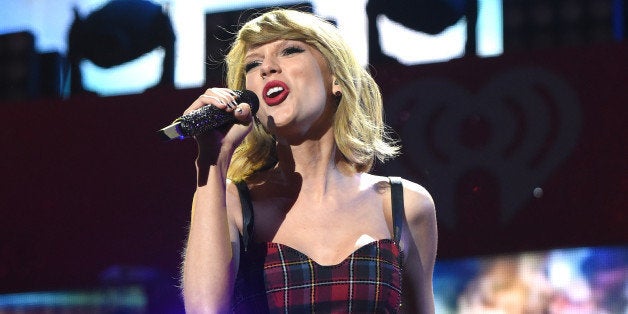 NEW YORK, NY - DECEMBER 12: Taylor Swift performs onstage during iHeartRadio Jingle Ball 2014, hosted by Z100 New York and presented by Goldfish Puffs at Madison Square Garden on December 12, 2014 in New York City. (Photo by Jamie McCarthy/Getty Images for iHeartMedia)