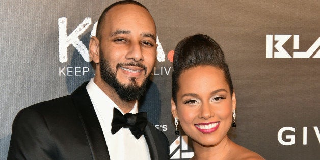 NEW YORK, NY - OCTOBER 30: Musicians Swizz Beats (L) and Alicia Keys attend Keep A Child Alive's 11th annual Black Ball at Hammerstein Ballroom on October 30, 2014 in New York City. (Photo by Theo Wargo/Child2014/WireImage)