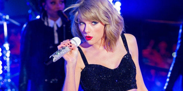 NEW YORK, NY - DECEMBER 31: Taylor Swift performs at Dick Clark's New Year's Rockin' Eve with Ryan Seacrest 2015 In Times Square at Times Square on December 31, 2014 in New York City. (Photo by Steve Mack/FilmMagic)