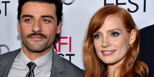 HOLLYWOOD, CA - NOVEMBER 06: Actors Oscar Isaac (L) and Jessica Chastain attend AFI FEST 2014 presented by Audi opening night gala premiere of A24's 'A Most Violent Year' at Dolby Theatre on November 6, 2014 in Hollywood, California. (Photo by Alberto E. Rodriguez/WireImage)