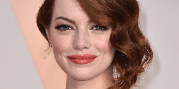 Emma Stone arrives at the Oscars on Sunday, Feb. 22, 2015, at the Dolby Theatre in Los Angeles. (Photo by Jordan Strauss/Invision/AP)