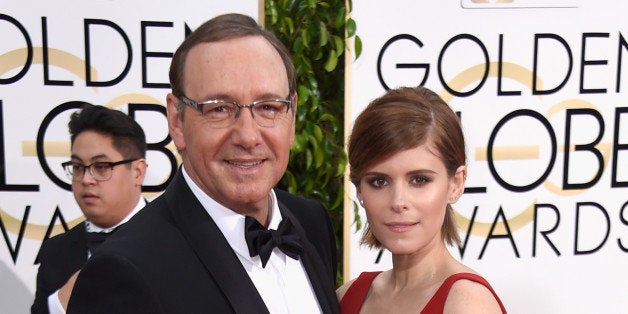 BEVERLY HILLS, CA - JANUARY 11: Actors Kevin Spacey (L) and Kate Mara attend the 72nd Annual Golden Globe Awards at The Beverly Hilton Hotel on January 11, 2015 in Beverly Hills, California. (Photo by Frazer Harrison/Getty Images)