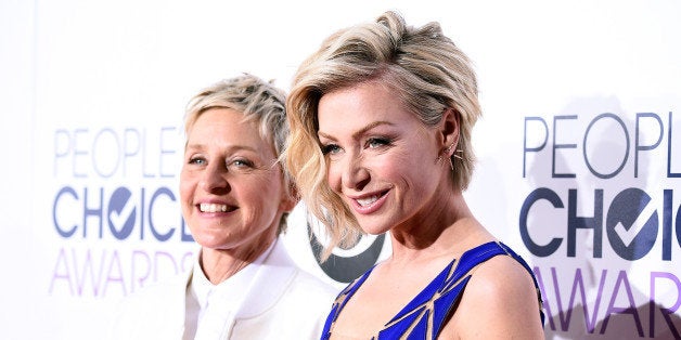 LOS ANGELES, CA - JANUARY 07: TV personality Ellen DeGeneres (L) and actress Portia de Rossi attend The 41st Annual People's Choice Awards at Nokia Theatre LA Live on January 7, 2015 in Los Angeles, California. (Photo by Frazer Harrison/Getty Images for The People's Choice Awards)