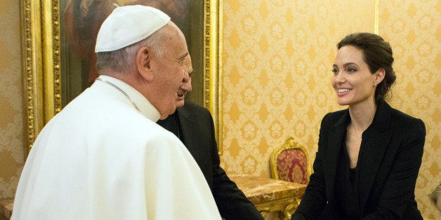 Pope Francis meets Angelina Jolie during a private audience at the Vatican, Thursday, Jan. 8, 2015. (AP Photo/L'Osservatore Romano, Pool)
