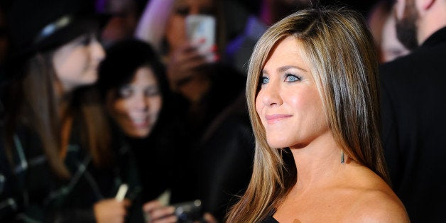 Actress Jennifer Aniston poses for photographers at the World Premiere of Horrible Bosses 2 at a central London cinema, London, Wednesday, Nov. 12, 2014. (Photo by Jonathan Short/Invision/AP)