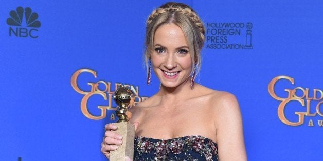 Actress Joanne Froggatt holds the award for Best Supporting Actress - Series/Mini-Series/TV Movie 'Downtown Abbey', in the press room at the 72nd annual Golden Globe Awards, January 11, 2015 at the Beverly Hilton Hotel in Beverly Hills, California. AFP PHOTO / FREDERIC J BROWN (Photo credit should read FREDERIC J. BROWN/AFP/Getty Images)