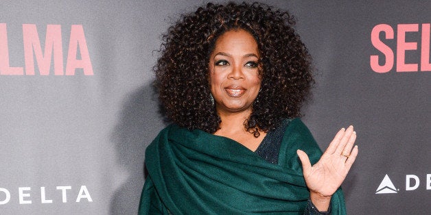 NEW YORK, NY - DECEMBER 14: Actress Oprah Winfrey enters the 'Selma' New York Premiere at the Ziegfeld Theater on December 1