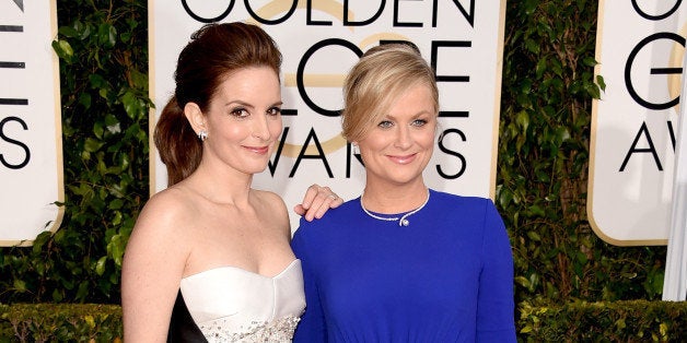 BEVERLY HILLS, CA - JANUARY 11: Golden Globes Hosts and Actresses Tina Fey and Amy Poehler attend the 72nd Annual Golden Globe Awards at The Beverly Hilton Hotel on January 11, 2015 in Beverly Hills, California. (Photo by Jason Merritt/Getty Images)