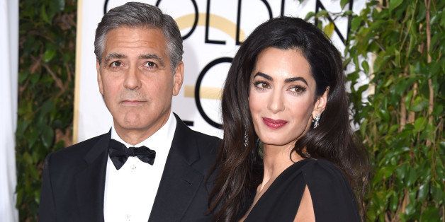 BEVERLY HILLS, CA - JANUARY 11: Actor George Clooney and lawyer Amal Alamuddin Clooney arrives at the 72nd Annual Golden Globe Awards at The Beverly Hilton Hotel on January 11, 2015 in Beverly Hills, California. (Photo by Steve Granitz/WireImage)