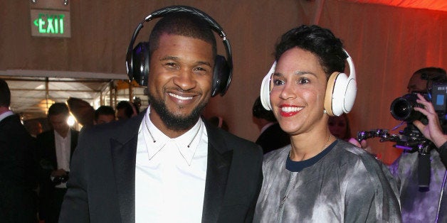 LOS ANGELES, CA - JANUARY 10: Recording artist Usher (L) and Grace Miguel, wearing Samsung Level headphones, attend the 8th Annual HEAVEN Gala presented by Art of Elysium and Samsung Galaxy at Hangar 8 on January 10, 2015 in Los Angeles, California. (Photo by Jonathan Leibson/Getty Images for Samsung)