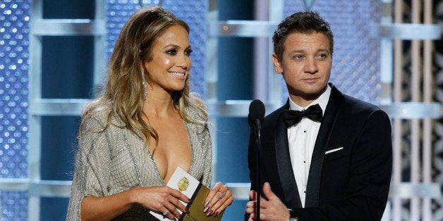 BEVERLY HILLS, CA - JANUARY 11: In this handout photo provided by NBCUniversal, Presenters Jennifer Lopez and Jeremy Renner speaks onstage during the 72nd Annual Golden Globe Awards at The Beverly Hilton Hotel on January 11, 2015 in Beverly Hills, California. (Photo by Paul Drinkwater/NBCUniversal via Getty Images)