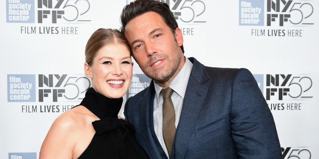 NEW YORK, NY - SEPTEMBER 26: Actors Rosamund Pike (L) and Ben Affleck attend the Opening Night Gala Presentation and World P