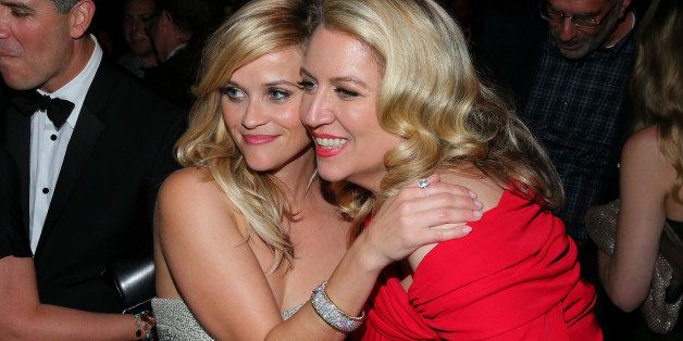 BEVERLY HILLS, CA - JANUARY 11: Actress Reese Witherspoon (L) and writer Cheryl Strayed attend The 72nd Annual Golden Globe Awards at The Beverly Hilton on January 11, 2015 in Beverly Hills, California. (Photo by Mark Davis/Getty Images for Fox Searchlight Pictures)