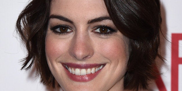 Anne Hathaway arrives at the AFI Awards at The Four Seasons Hotel on Friday, Jan. 9, 2015 in Los Angeles. (Photo by Jordan Strauss/Invision/AP)