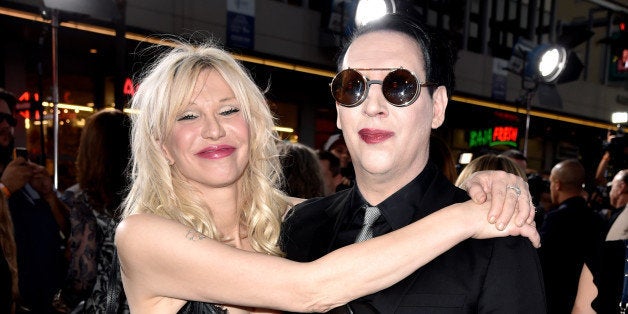 LOS ANGELES, CA - SEPTEMBER 06: Singers Courtney Love and Marilyn Manson arrive at the season 7 premiere screening of FX's '
