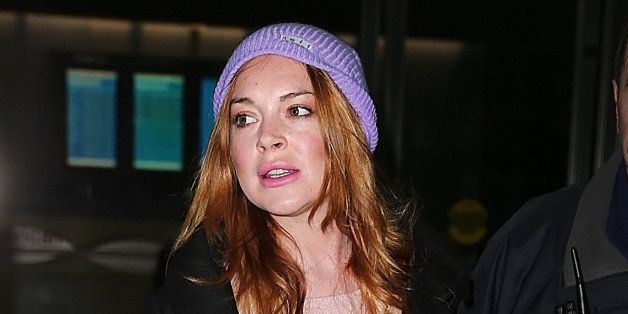 NEW YORK, NY - DECEMBER 30: Lindsay Lohan is seen on December 30, 2014 in New York City. (Photo by XPX/Star Max/GC Images)