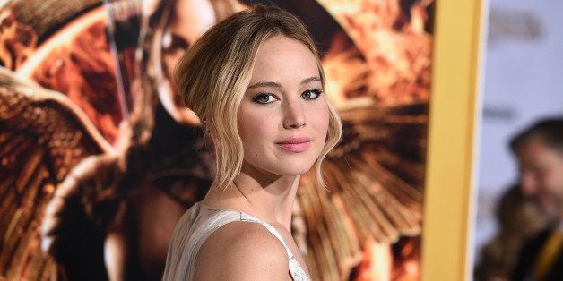 Jennifer Lawrence arrives at the Los Angeles premiere of "The Hunger Games: Mockingjay - Part 1" at the Nokia Theatre L.A. Live on Monday, Nov. 17, 2014. (Photo by Jordan Strauss/Invision/AP)