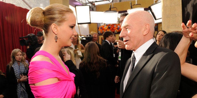 Jennifer Lawrence and Patrick Stewart arrives at the TNT/TBS broadcast of the 17th Annual Screen Actors Guild Awards held at