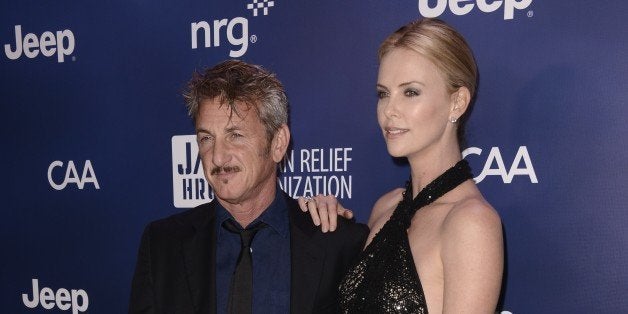 Sean Penn, left, and Charlize Theron arrive at the 4th annual Sean Penn and Friends "Help Haiti Home" Gala at the Montage Hotel on Saturday, Jan. 10, 2015, in Beverly Hills, Calif. (Photo by Dan Steinberg/Invision/AP)