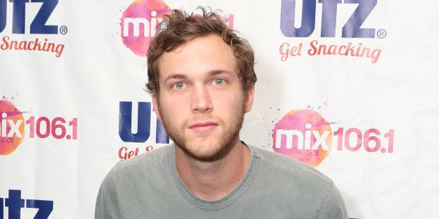 Singer-songwriter Phillip Phillips visits the Mix 106 Performance Theater on Friday, July 18, 2014, in Philadelphia. (Photo by Owen Sweeney/Invision/AP)