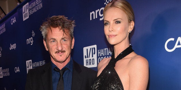 LOS ANGELES, CA - JANUARY 10: Founder and CEO of J/P Haitian Relief Organization Sean Penn (L) and Charlize Theron attend the 4th Annual Sean Penn & Friends HELP HAITI HOME Gala Benefiting J/P Haitian Relief Organization on January 10, 2015 in Los Angeles, California. (Photo by Alberto E. Rodriguez/Getty Images for J/P Haitian Relief Organization)