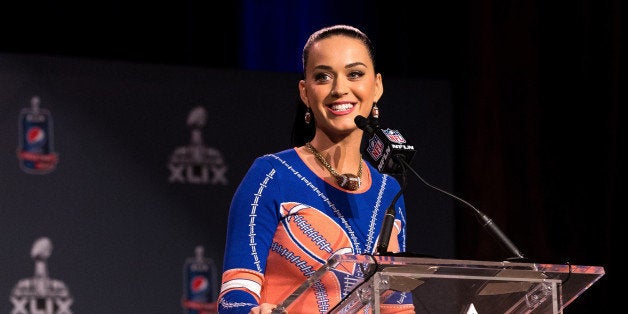 PHOENIX, AZ - JANUARY 29: Recording artist Katy Perry speaks onstage at the Pepsi Super Bowl XLIX Halftime Show Press Confer