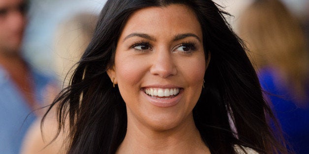 Kourtney Kardashian attends the "Party Under The Stars" benefit hosted by Women's Health and Feed at the Bridgehampton Tennis and Surf Club on Saturday, Aug. 9, 2014 in New York. (Photo by Scott Roth/Invision/AP)