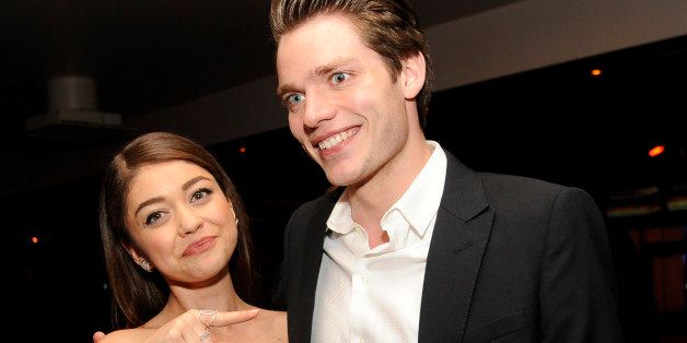 Sarah Hyland, left, and Dominic Sherwood, cast members in "Vampire Academy," pose together at the post-premiere party for the film on Tuesday, Feb. 4, 2014, in Los Angeles. (Photo by Chris Pizzello/Invision/AP)