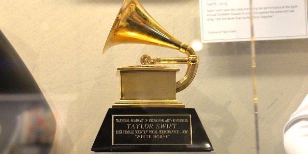 LOS ANGELES, CA - DECEMBER 12: Atmosphere shot of a GRAMMY Award belonging to Taylor Swift at media preview day of 'The Taylor Swift Experience' at The GRAMMY Museum on December 12, 2014 in Los Angeles, California. (Photo by Michael Tullberg/Getty Images)