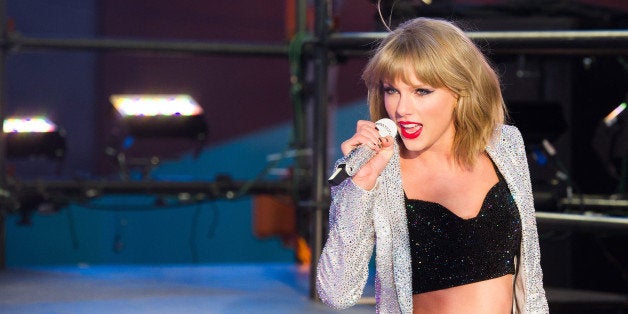 Taylor Swift performs in Times Square during New Year's Eve celebrations on Wednesday, Dec. 31, 2014 in New York. (Photo by C