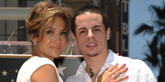 Jennifer Lopez, left, and Beau "Casper" Smart pose with her new star on the Hollywood Walk of Fame on Thursday, June 20, 2013 in Los Angeles. (Photo by John Shearer/Invision/AP)