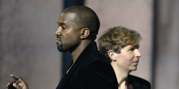 Winner for Album Of The Year Beck reacts as Kanye West appears on stage at the 57th Annual Grammy Awards in Los Angeles February 8, 2015. AFP PHOTO / ROBYN BECK (Photo credit should read ROBYN BECK/AFP/Getty Images)