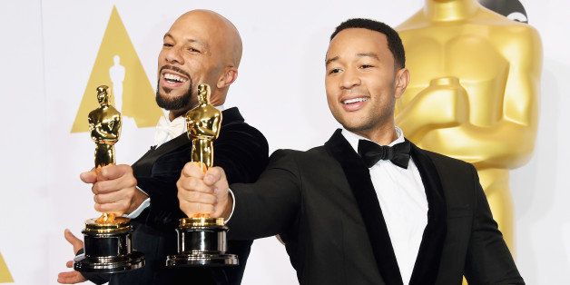 HOLLYWOOD, CA - FEBRUARY 22: Lonnie Lynn aka Common (L) and John Stephens aka John Legend winners of the Best Original Song Award for 'Glory' from 'Selma' pose in the press room during the 87th Annual Academy Awards at Loews Hollywood Hotel on February 22, 2015 in Hollywood, California. (Photo by Jason Merritt/Getty Images)