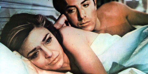 Anne Bancroft in bed with Dustin Hoffman in a scene from the film 'The Graduate', 1967. (Photo by Embassy Pictures/Getty Images)