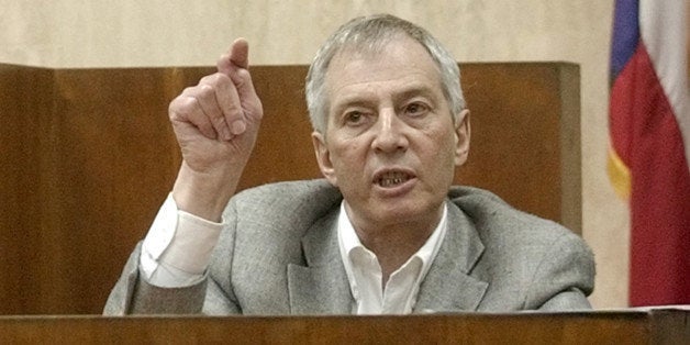 Multi-millionaire murder defendant Robert Durst testifies during the prosecutions' cross examination Monday, Oct. 27, 2003, in Galveston, Texas. The son of a New York City real estate tycoon, Durst is accused of murder for killing a neighbor at a low-rent Galveston apartment house where they both lived, then dismembering the victim and throwing the body parts into Galveston Bay. (AP Photo/Pat Sullivan)