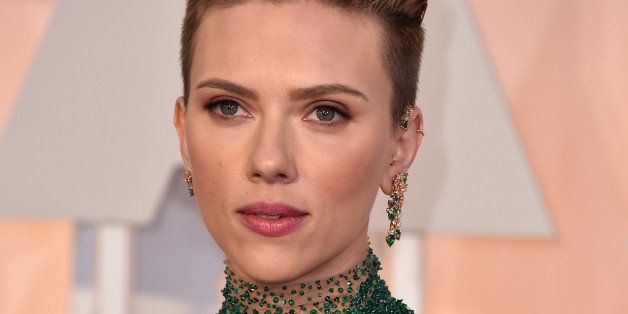 Scarlett Johansson arrives at the Oscars on Sunday, Feb. 22, 2015, at the Dolby Theatre in Los Angeles. (Photo by Jordan Strauss/Invision/AP)