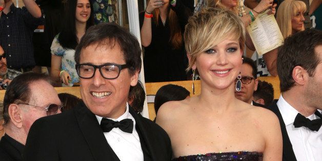 LOS ANGELES, CA - JANUARY 18: Director David O. Russell and actress Jennifer Lawrence attends the 20th Annual Screen Actors Guild Awards at The Shrine Auditorium on January 18, 2014 in Los Angeles, California. (Photo by Frederick M. Brown/Getty Images)
