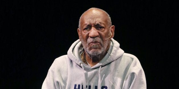 Comedian Bill Cosby performs at the Buell Theater in Denver, Saturday, Jan. 17, 2015. Cosby, 77, is facing sexual assault acc