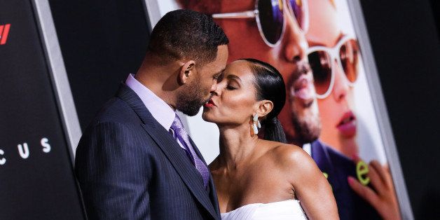 Will Smith, left, and Jada Pinkett Smith arrive at the world premiere of "Focus" at the TCL Chinese Theatre on Tuesday, Feb. 24, 2015, in Los Angeles. (Photo by John Salangsang/Invision/AP)