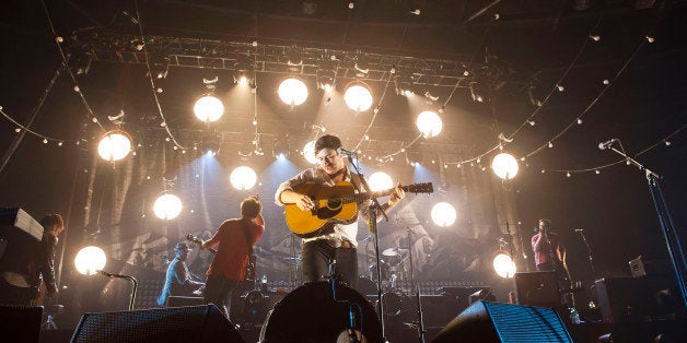 BERLIN, GERMANY - APRIL 02: British singer Marcus Mumford of Mumford & Sons performs live during a concert at the Velodrom on