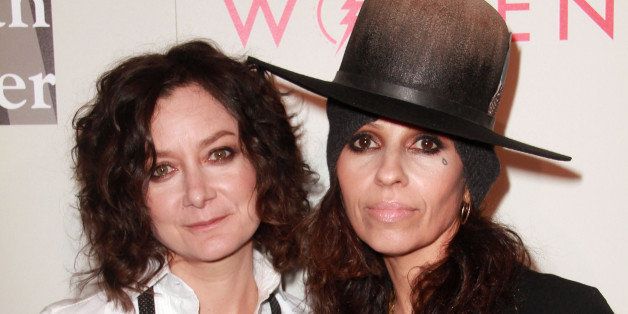 Sara Gilbert, Linda Perry arrives at The L.A. Gay and Lesbian Center's Annual &quot;An Evening With Women&quot; at The Beverly Hilton on Saturday, May 10, 2014, in Beverly Hills. (Photo by Theresa Bouche/Invision/AP Images)