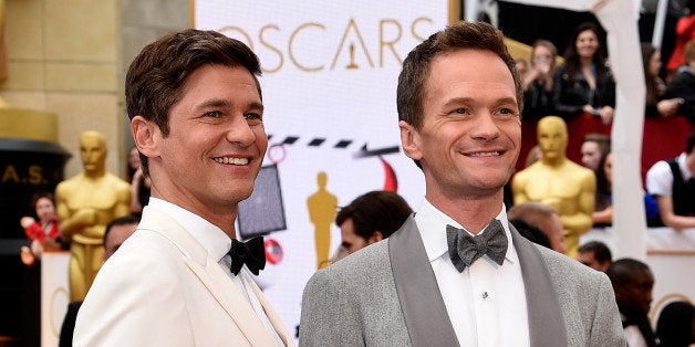 HOLLYWOOD, CA - FEBRUARY 22: Host Neil Patrick Harris (R) and actor David Burtka attend the 87th Annual Academy Awards at Hollywood & Highland Center on February 22, 2015 in Hollywood, California. (Photo by Kevork Djansezian/Getty Images)