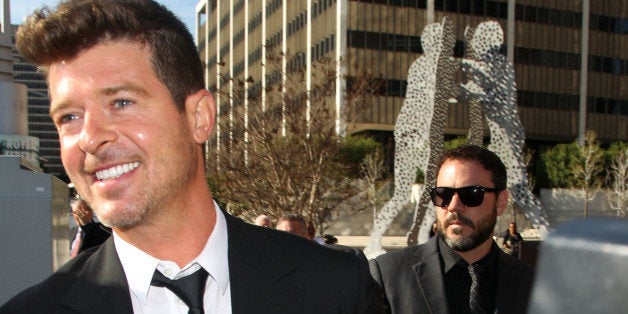 LOS ANGELES, CA - MARCH 04: Musician Robin Thicke is seen outside the Roybal Federal Building on March 4, 2015 in Los Angeles, California. Thicke and co-writers of the song 'Blurred Lines' are being sued by the children of singer Marvin Gaye for using elements of Gaye's song 'Got to Give it Up' in 'Blurred Lines.' (Photo by David Buchan/Getty Images)