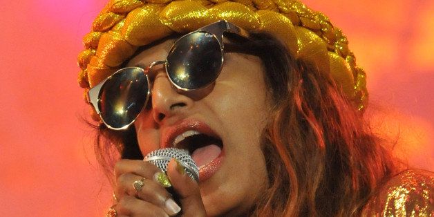 GLASTONBURY, ENGLAND - JUNE 27: Mathangi 'Maya' Arulpragasam, aka M.I.A, performs live on stage on the West Holts stage during Day One of the Glastonbury Festival at Worthy Farm in Pilton on June 27, 2014 in Glastonbury, England. Tickets to the event, which is now in its 44th year, sold out in minutes even before any of the headline acts had been confirmed. The festival, which started in 1970 when several hundred hippies paid Â£1, now attracts more than 175,000 people. (Photo by Jim Dyson/Getty Images)