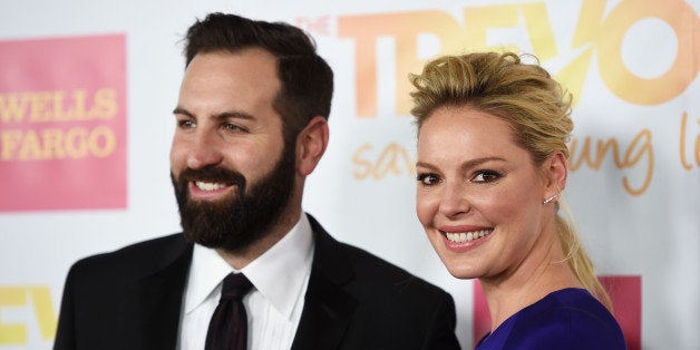 LOS ANGELES, CA - DECEMBER 07: Actress Katherine Heigl (R) and her husband, musician Josh Kelley arrive at the TrevorLIVE Los Angeles benefit event at the Hollywood Palladium on December 7, 2014 in Los Angeles, California. (Photo by Amanda Edwards/WireImage)