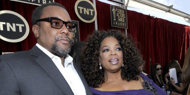 LOS ANGELES, CA - JANUARY 18: Director Lee Daniels (L) and actress-TV personality Oprah Winfrey attend the 20th Annual Screen Actors Guild Awards at The Shrine Auditorium on January 18, 2014 in Los Angeles, California. (Photo by Kevork Djansezian/Getty Images)